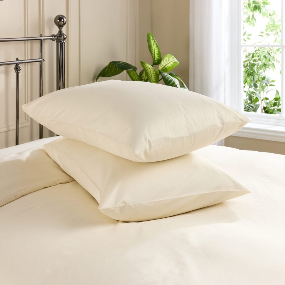 Two pillows with cream coloured Hotel Pure Luxury classic standard pillowcases