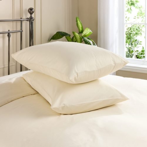 Two pillows with cream coloured Hotel Pure Luxury classic standard pillowcases