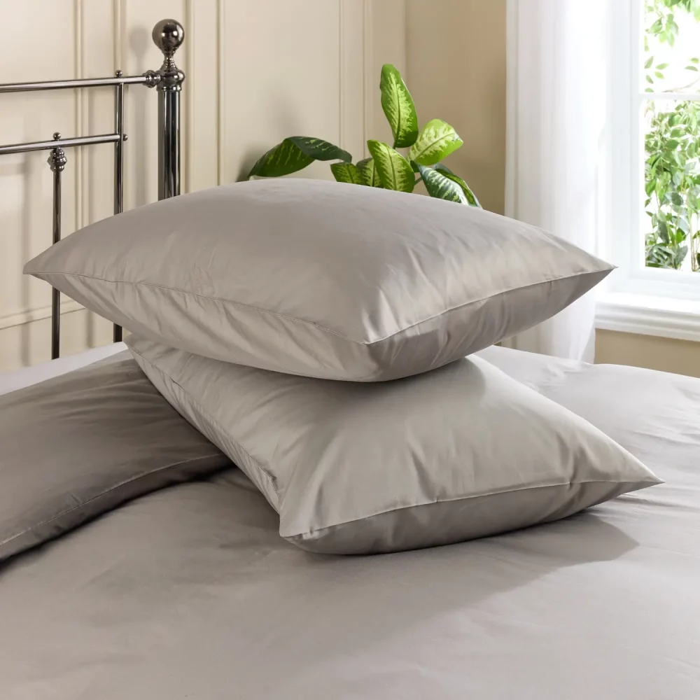 Two pillows with grey coloured Hotel Pure Luxury classic standard pillowcases