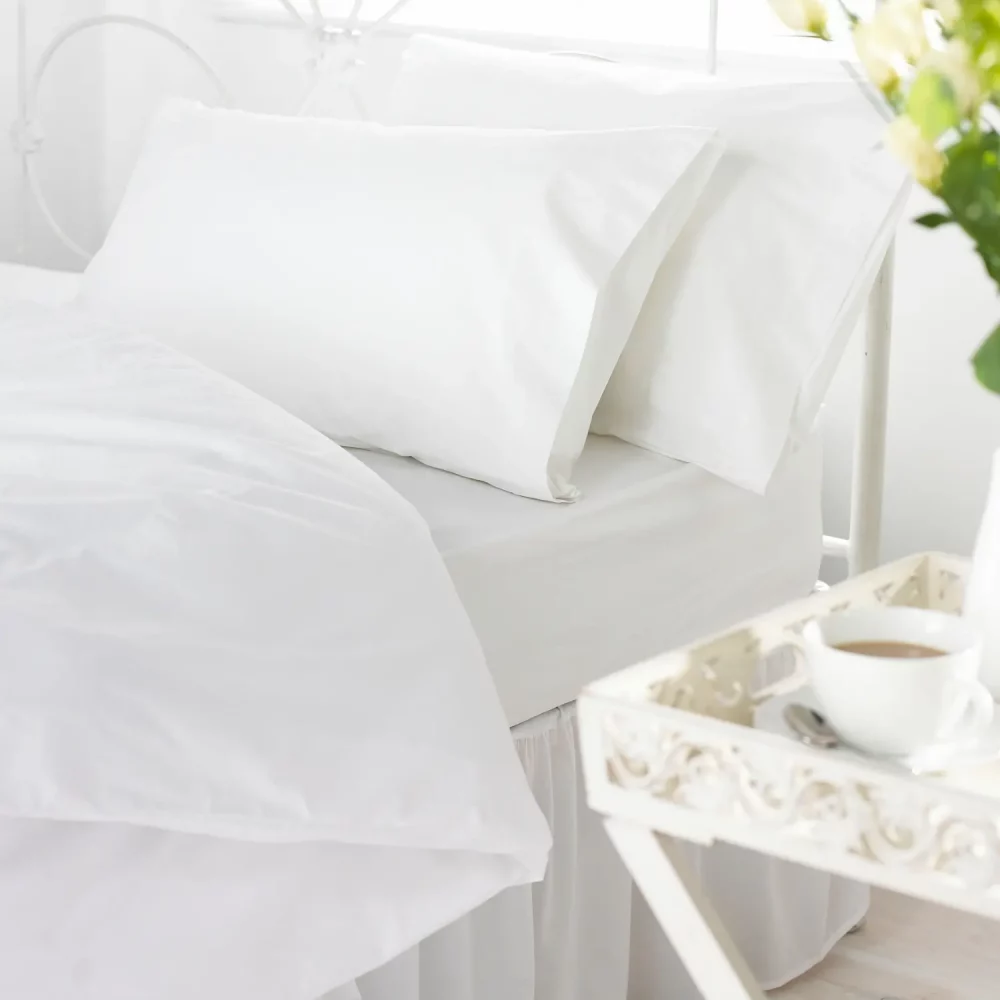 Vision Essentials Polycotton Plain Fitted Sheet on Bed