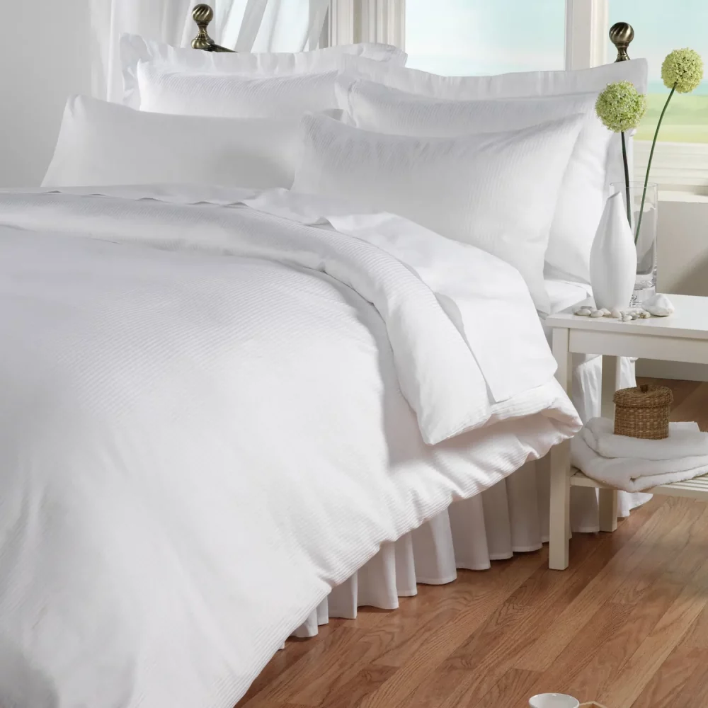 A 100% cotton white duvet cover with a 5mm satin stripe design. From Liddell.
