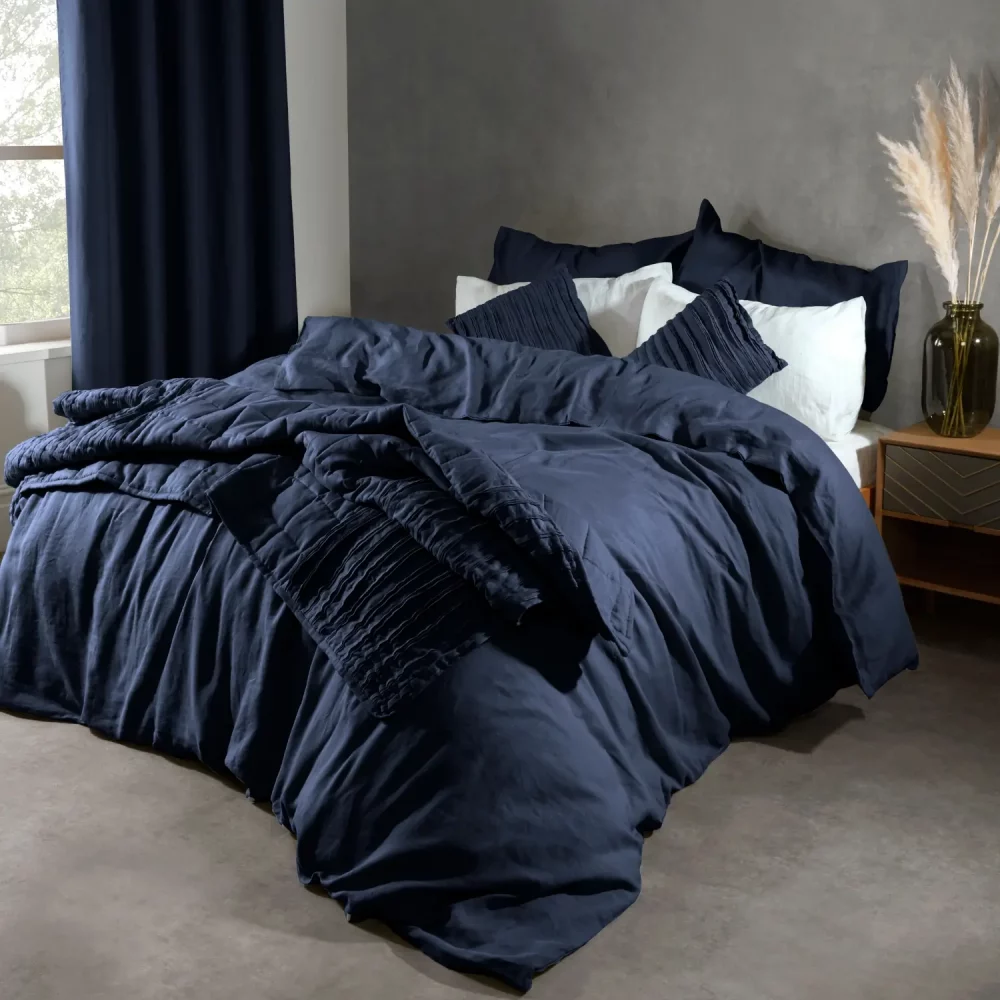 Lazy Linen Navy Throw On Bed