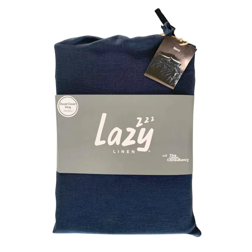 Package shot for the Lazy Linen navy colour duvet cover, made from 100% washed linen.