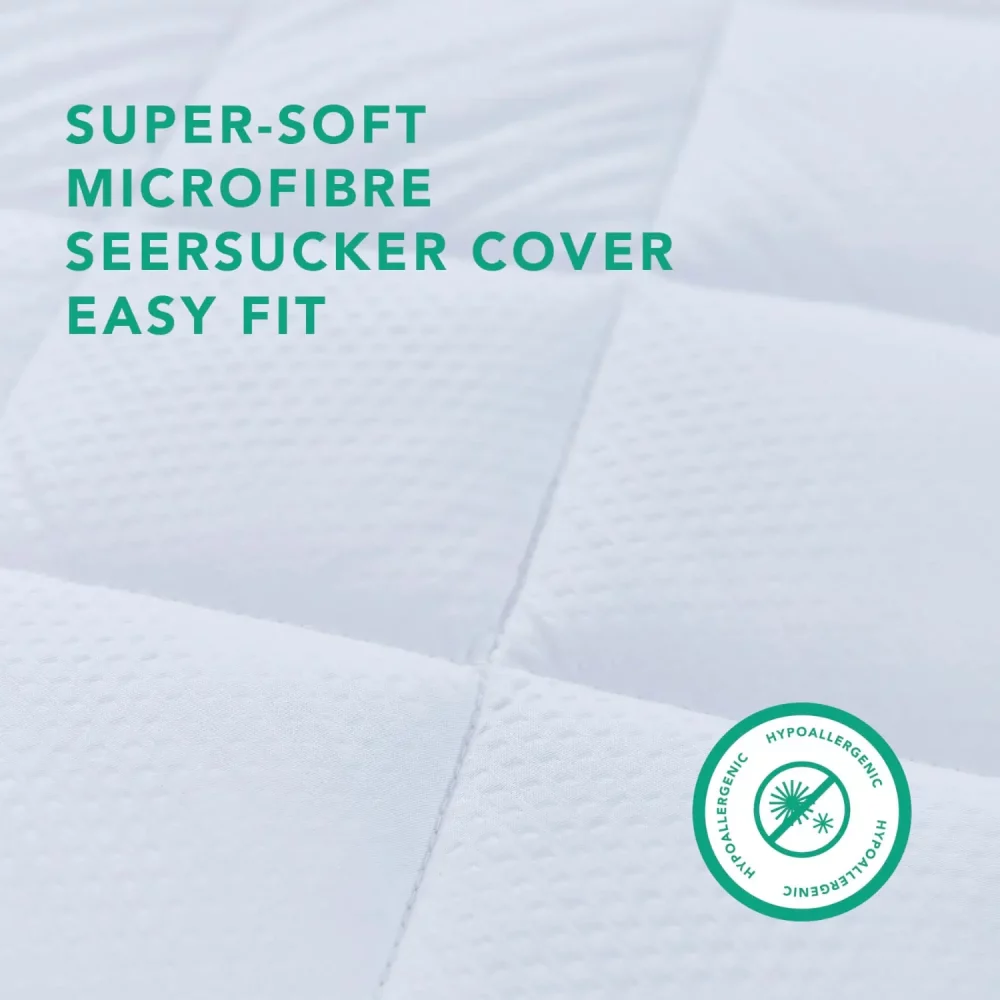 Close-up of a super soft microfibre seersucker easy fit cover on a mattress topper