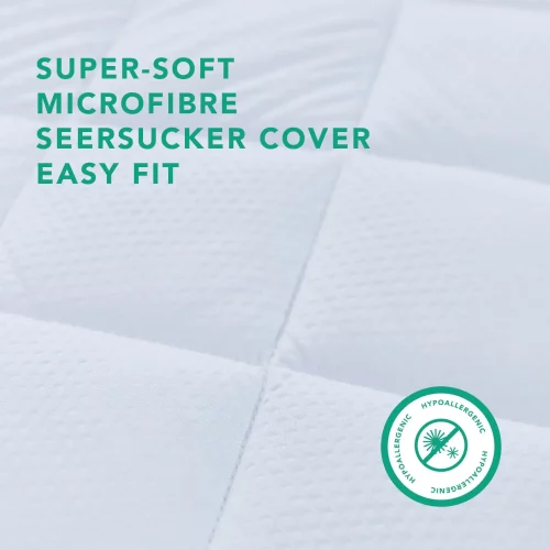 Close-up of a super soft microfibre seersucker easy fit cover on a mattress topper