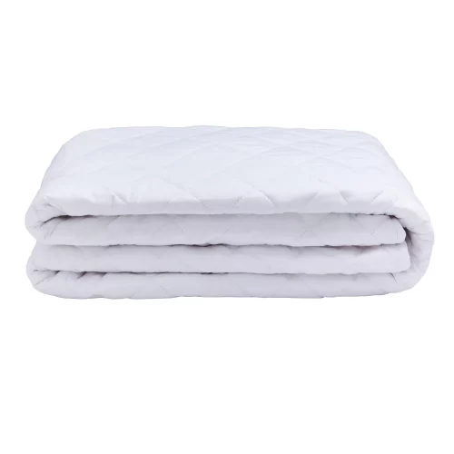 A Martex 100% cotton quilted mattress protector folded up.