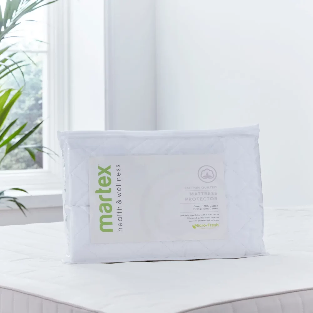 Package shot of a Martex 100% cotton quilted mattress protector.