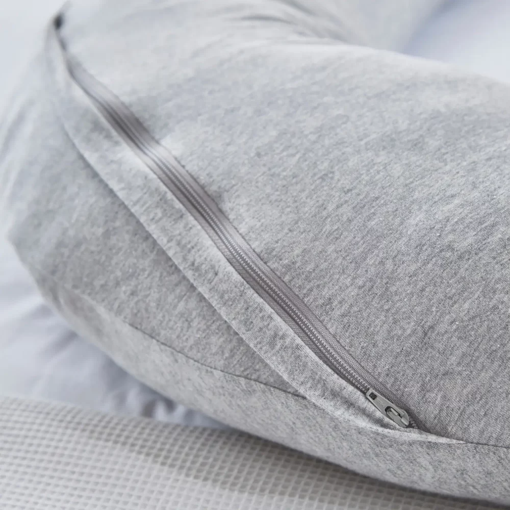 Close up of the zip on a Martex Baby pregnancy and nursing pillow in grey.