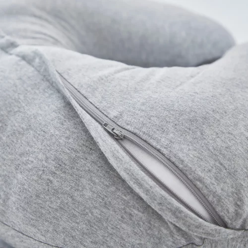 Close up of the zip on a Martex Baby pregnancy and nursing pillow in grey. The zip is slightly open.