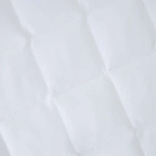 A close up of a Clair De Lune anti-allergy quilted mattress protect