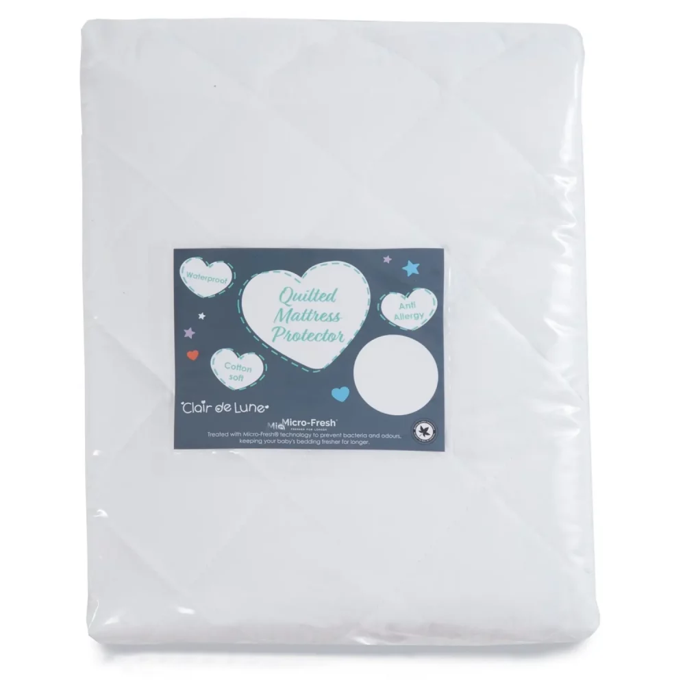 A Clair De Lune anti-allergy quilted mattress protector for cot beds in its packaging.