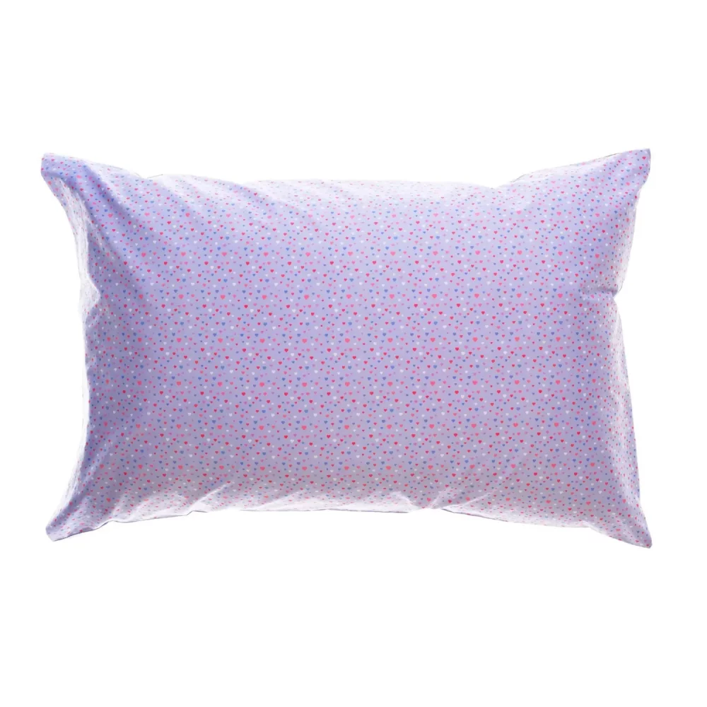 A reverse of a lilac pillowcase from Rachel Riley. The pattern only includes multi-coloured love hearts.
