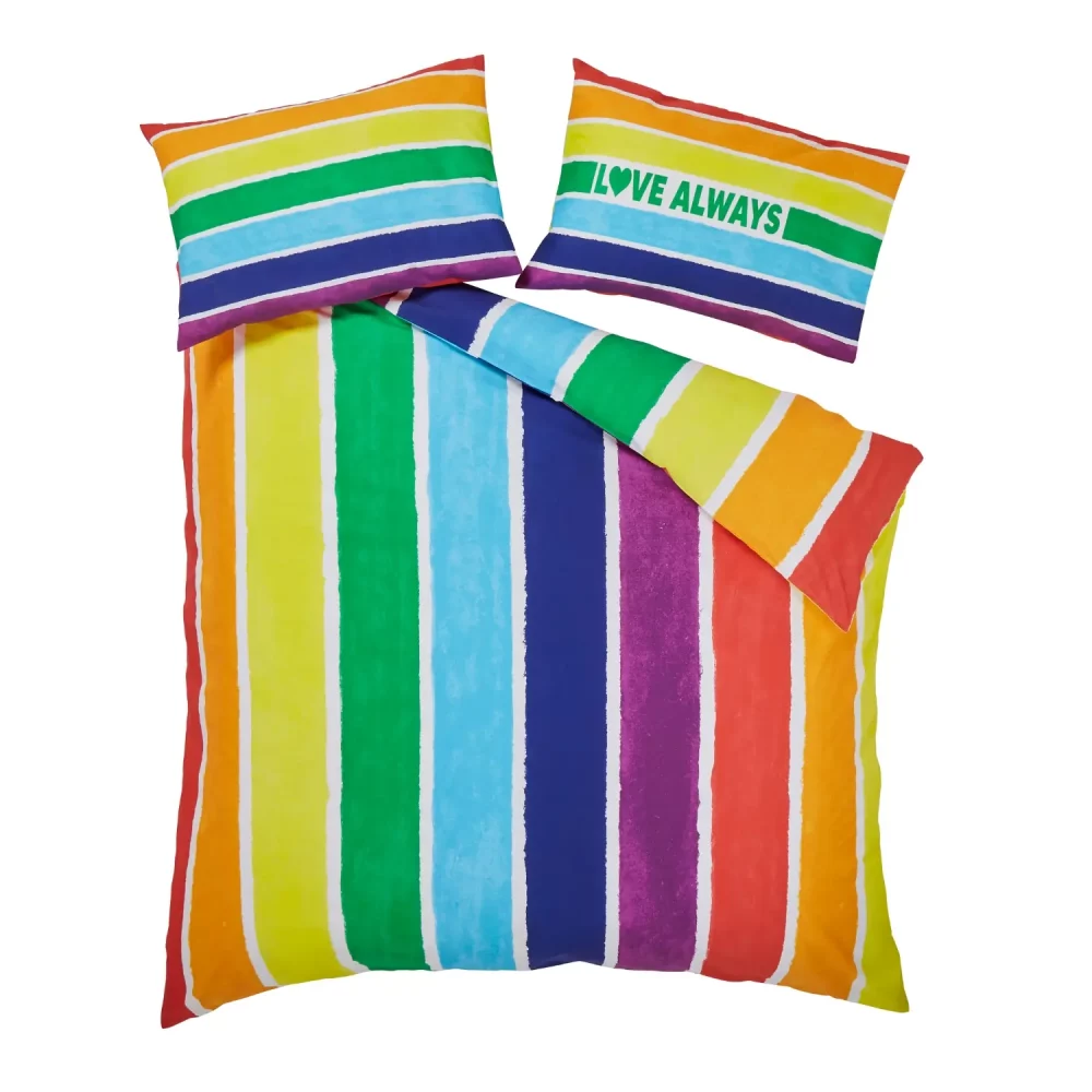 A multi-coloured rainbow Pride themed duvet cover and pillowcase set from Martex Pride on a white background. It says 'Love Always' on one of the pillowcases.