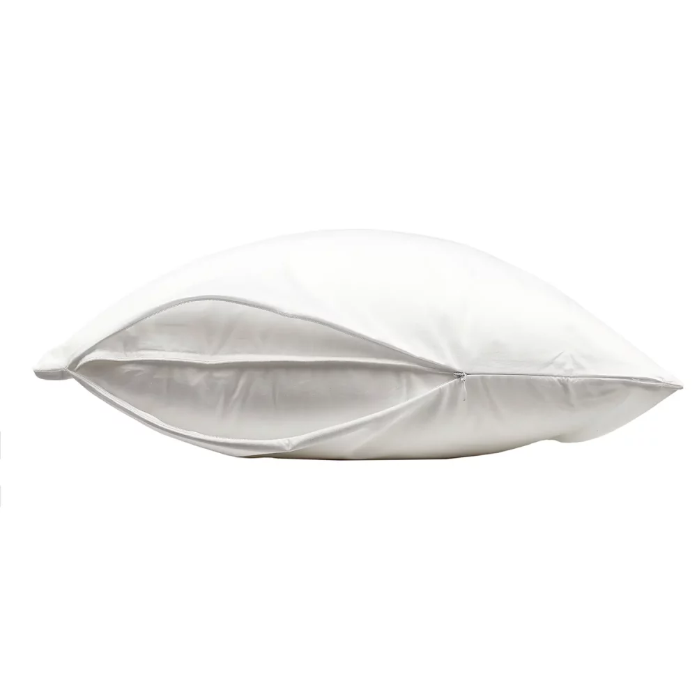 A white Hotel Pure Luxury polycotton pillow protector on a white background. You can see the zipper that's currently slightly open so you can see the pillow inside.