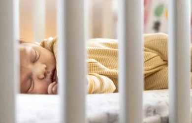 Baby sleeping in crib